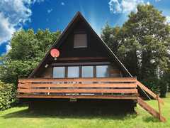 Gemütliches Ferienhaus für 1-6 Personen.<br>88 qm Wfl - 600 qm Garten. 3 Schlafzimmer<br>Ruhige